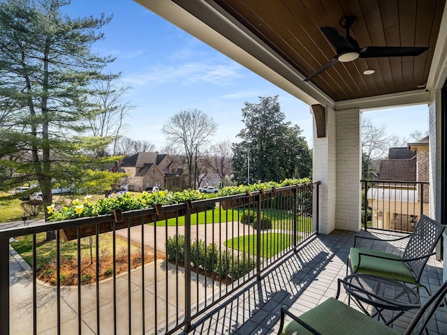 balcony featuring a ceiling fan