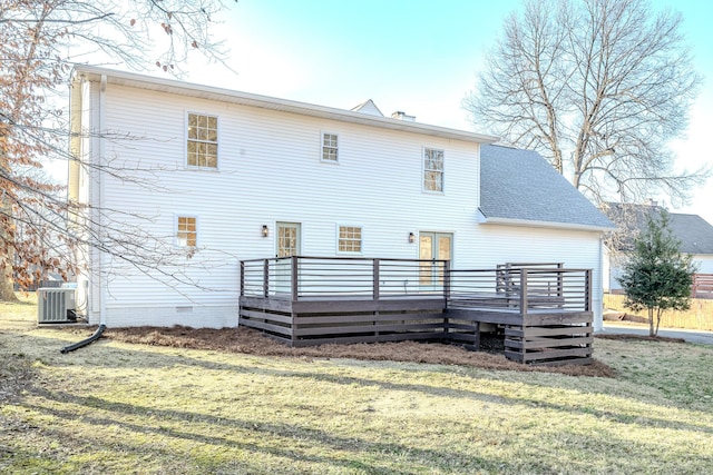 rear view of house with a wooden deck, a yard, central AC, and crawl space