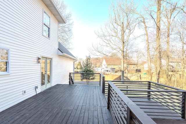 wooden terrace featuring french doors