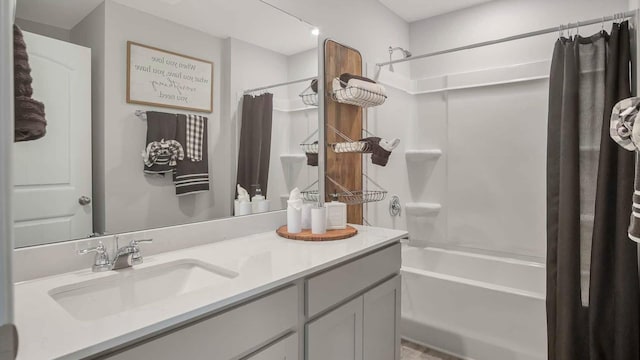 full bathroom featuring shower / tub combo with curtain and vanity