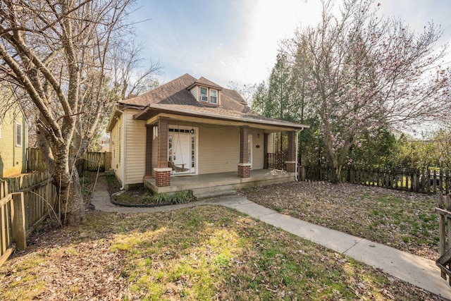 4509 Wyoming Ave, Nashville, TN 37209 - view of front of property featuring covered porch and a fenced backyard