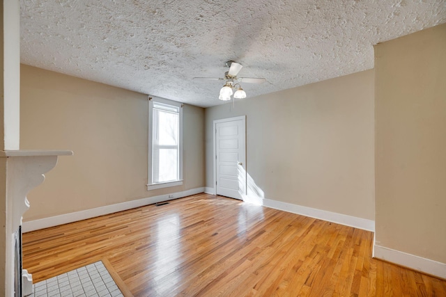 4509 Wyoming Ave, Nashville, TN 37209 - interior space featuring a textured ceiling, baseboards, light wood-type flooring, and ceiling fan