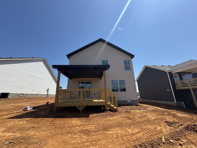 153 Cardinal Crk, Clarksville, TN 37040 - rear view of house featuring crawl space and a wooden deck