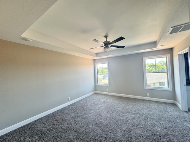 153 Cardinal Crk, Clarksville, TN 37040 - empty room with a raised ceiling, carpet flooring, and baseboards