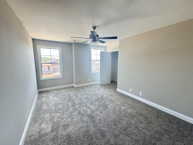 153 Cardinal Crk, Clarksville, TN 37040 - unfurnished bedroom featuring carpet floors, baseboards, a ceiling fan, and a closet