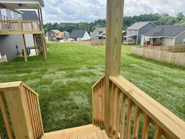 153 Cardinal Crk, Clarksville, TN 37040 - view of yard featuring a residential view, a wooden deck, stairs, and a ceiling fan