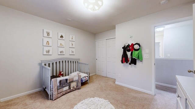 1504 Rockwood Ln, Lebanon, TN 37087 - bedroom with light colored carpet, a closet, and baseboards