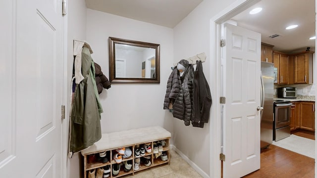 1504 Rockwood Ln, Lebanon, TN 37087 - mudroom with recessed lighting, visible vents, baseboards, and light wood-style flooring