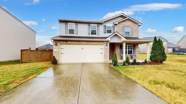 1504 Rockwood Ln, Lebanon, TN 37087 - traditional-style home featuring brick siding, fence, concrete driveway, a front yard, and an attached garage