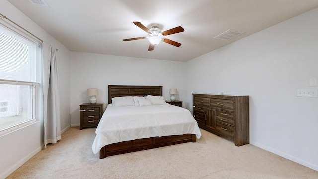 1504 Rockwood Ln, Lebanon, TN 37087 - bedroom with a ceiling fan, baseboards, visible vents, and light carpet