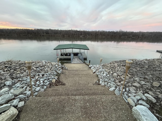 dock area with a water view