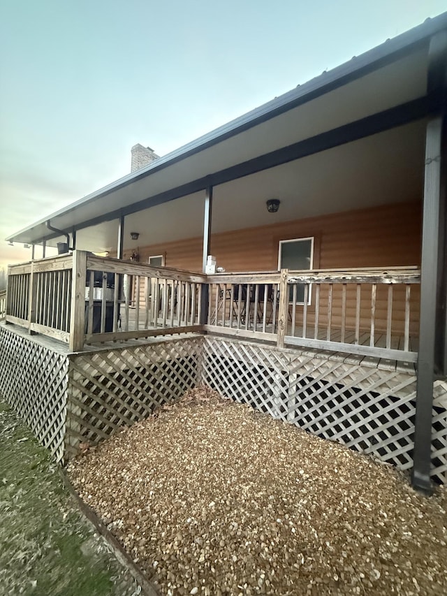 exterior space featuring a wooden deck