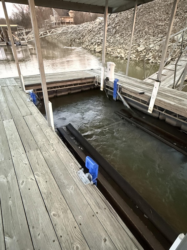 view of dock with a water view