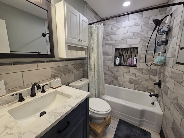 bathroom with tasteful backsplash, tile walls, toilet, shower / tub combo with curtain, and vanity