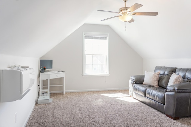 interior space with baseboards, carpet floors, lofted ceiling, and ceiling fan