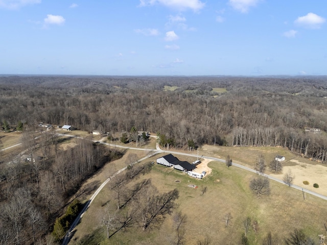 aerial view with a rural view and a view of trees