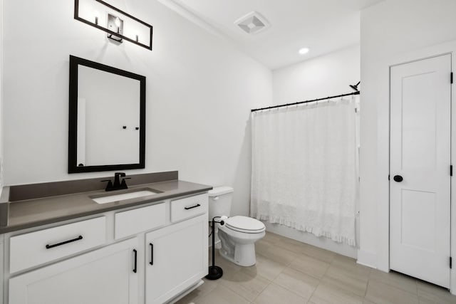 full bathroom with visible vents, toilet, and vanity