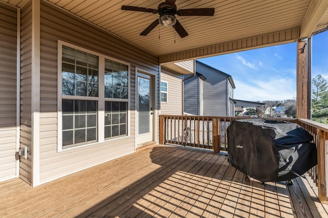 deck featuring grilling area and ceiling fan