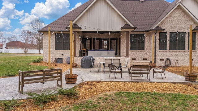 view of patio with grilling area, an outdoor hangout area, and ceiling fan