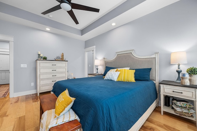 bedroom with recessed lighting, baseboards, wood finished floors, and a ceiling fan