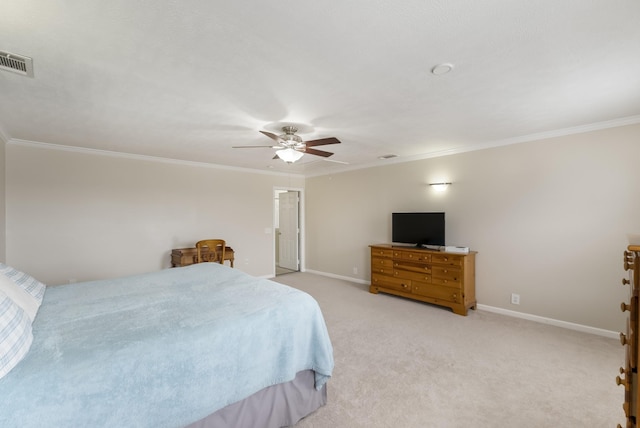 bedroom with ornamental molding, baseboards, visible vents, and light carpet