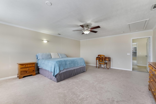 bedroom with visible vents, crown molding, baseboards, attic access, and light carpet