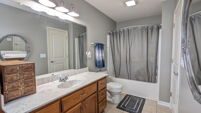 full bath with tile patterned flooring, shower / bath combination with curtain, toilet, and vanity