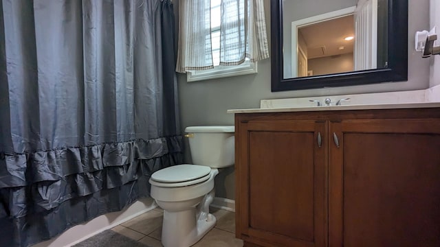 full bathroom featuring tile patterned floors, vanity, toilet, and a shower with shower curtain