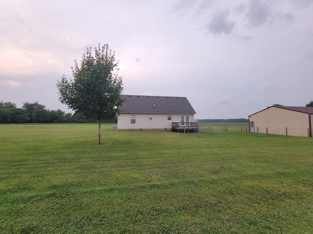 view of yard with an outbuilding and an outdoor structure