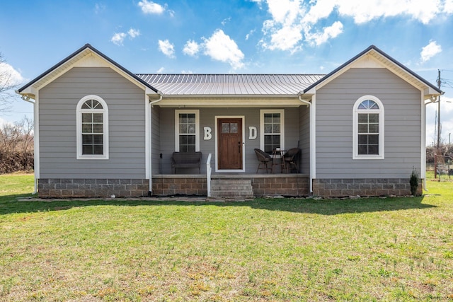 365 Voss St, Lawrenceburg, TN 38464 - single story home featuring a front yard, covered porch, and metal roof