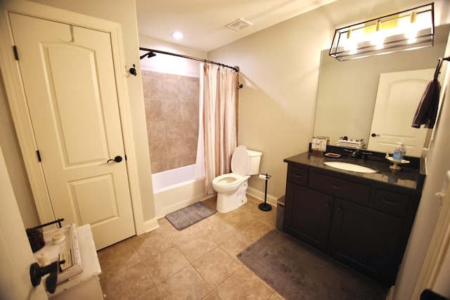 full bath featuring tile patterned floors, visible vents, toilet, shower / bath combo, and vanity