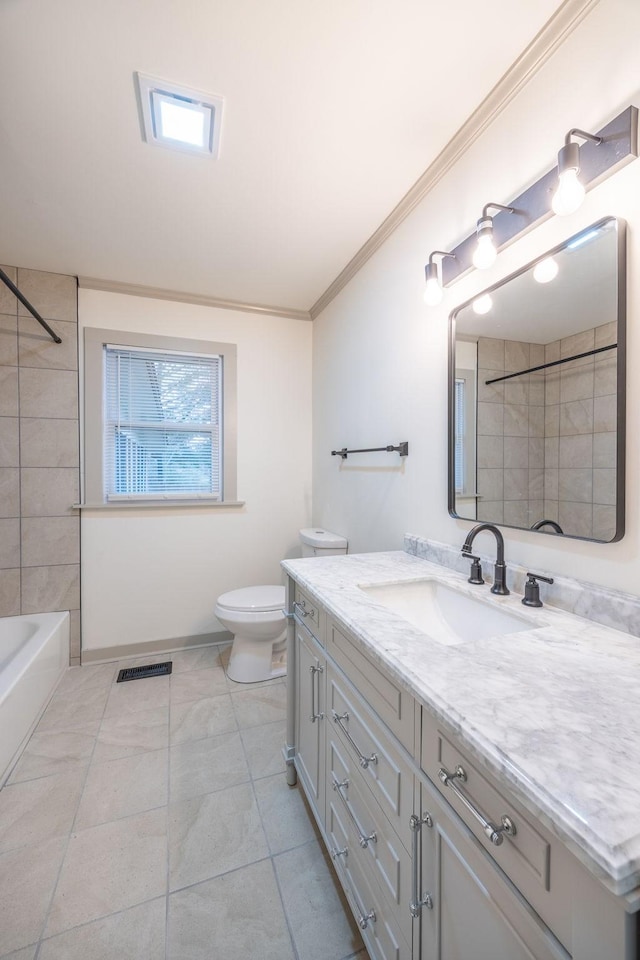 full bath with visible vents, toilet, crown molding, baseboards, and vanity