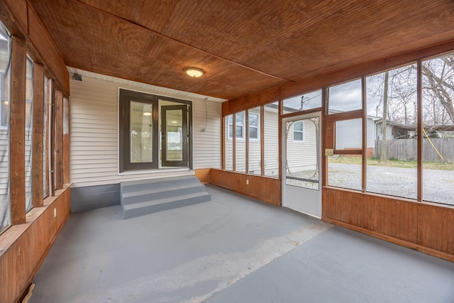 unfurnished sunroom with entry steps