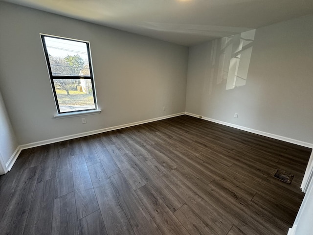 1239 N Graycroft Ave, Madison, TN 37115 - empty room with baseboards and dark wood-style flooring