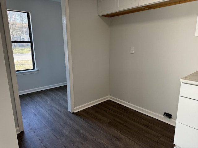 1239 N Graycroft Ave, Madison, TN 37115 - laundry area with baseboards and dark wood-style floors