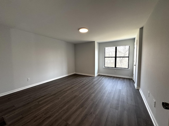 1239 N Graycroft Ave, Madison, TN 37115 - unfurnished room featuring dark wood-type flooring and baseboards