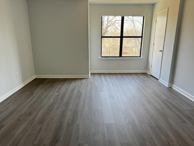 1239 N Graycroft Ave, Madison, TN 37115 - unfurnished room with dark wood finished floors and baseboards