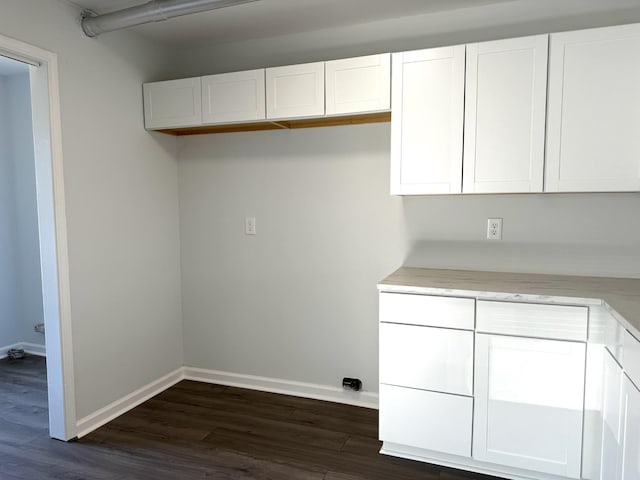 1239 N Graycroft Ave, Madison, TN 37115 - laundry area featuring dark wood-style floors and baseboards