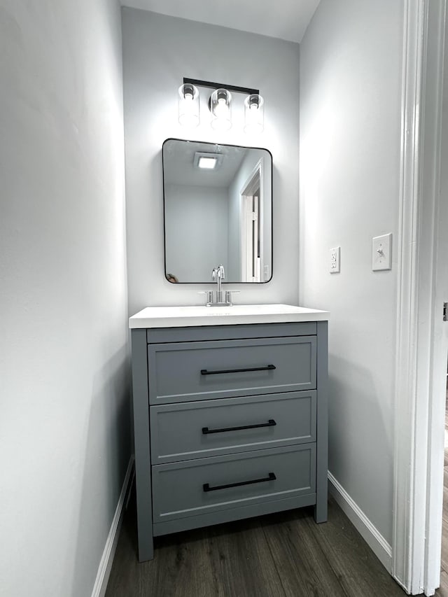 1239 N Graycroft Ave, Madison, TN 37115 - bathroom featuring vanity, baseboards, and wood finished floors