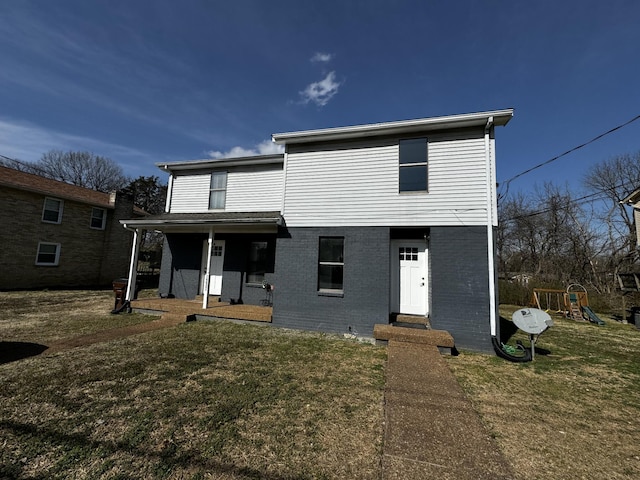 1239 N Graycroft Ave, Madison, TN 37115 - traditional-style house featuring brick siding, a front yard, and a playground