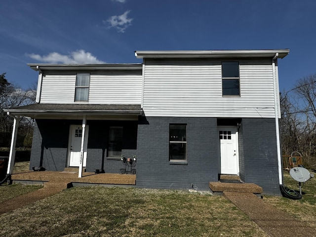 1239 N Graycroft Ave, Madison, TN 37115 - view of front of property with brick siding, entry steps, and a front lawn