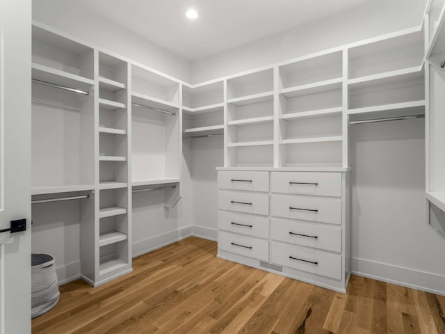 walk in closet featuring light wood-type flooring