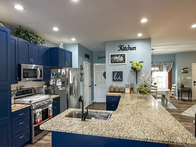 670 Jones Franklin Rd, Morristown, TN 37813 - kitchen featuring appliances with stainless steel finishes, blue cabinetry, a sink, and recessed lighting