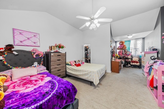 bedroom with lofted ceiling, carpet flooring, and a ceiling fan