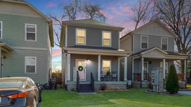 view of front of home featuring a porch and a front lawn