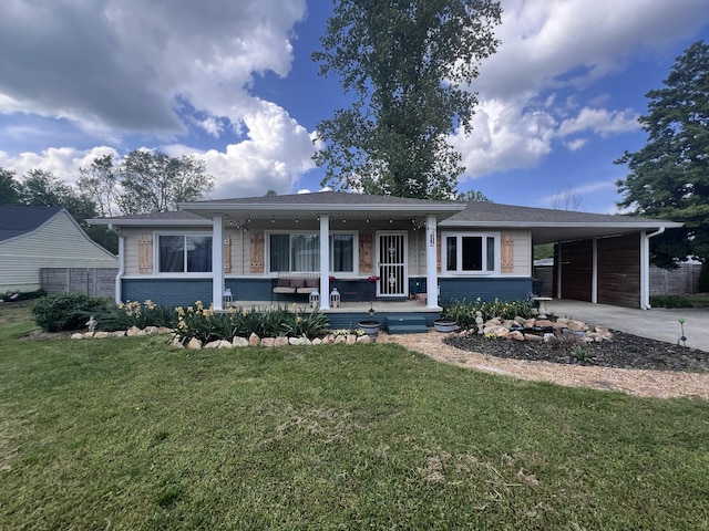 216 1st St, Monteagle, TN 37356 - ranch-style house with brick siding, an attached carport, outdoor lounge area, a front yard, and concrete driveway