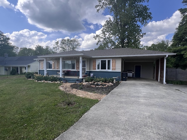 216 1st St, Monteagle, TN 37356 - ranch-style house featuring a porch, an attached carport, driveway, and a front lawn