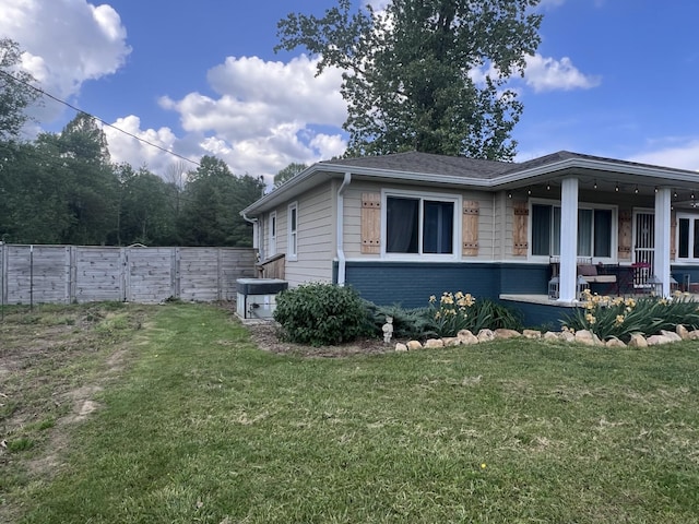 216 1st St, Monteagle, TN 37356 - view of side of property featuring a lawn and fence