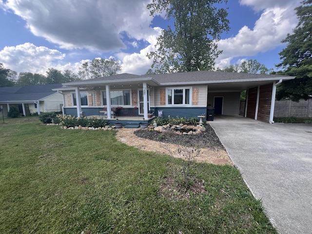 216 1st St, Monteagle, TN 37356 - ranch-style house with covered porch, a carport, driveway, and a front lawn
