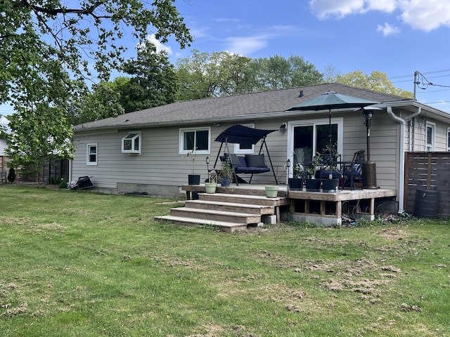 216 1st St, Monteagle, TN 37356 - back of property with a yard, fence, and a wooden deck